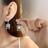 Luxury Crystal Geometric Tassel Earrings: High-End Irregular Square Dangle for Women's Fashion.