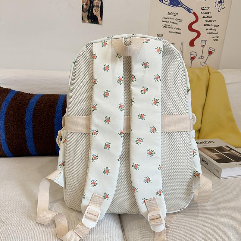 Schultasche frisches Blumenmuster neuer Rucksack japanische Mittelschüler College-Stil große Kapazität Schultasche lässiger vielseitiger Rucksack