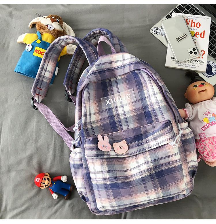 Schoolbag autumn fresh and simple plaid schoolbag female Korean version junior high school college student backpack campus versatile casual backpack