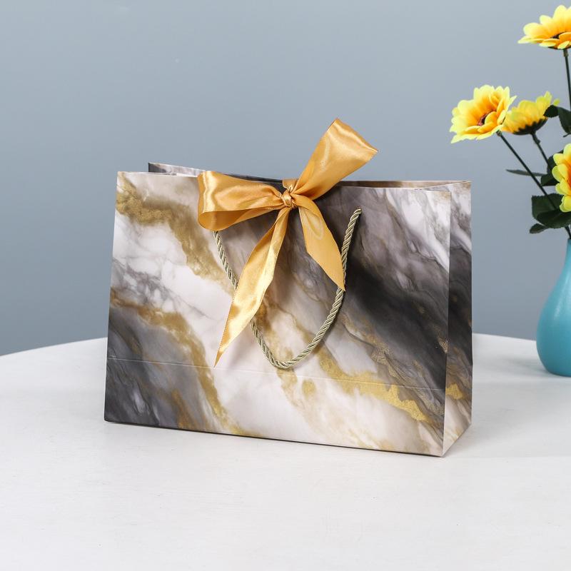 In-Stock White Cardboard Gift Bags with Bow Handle, Customizable Logo for Clothing Stores