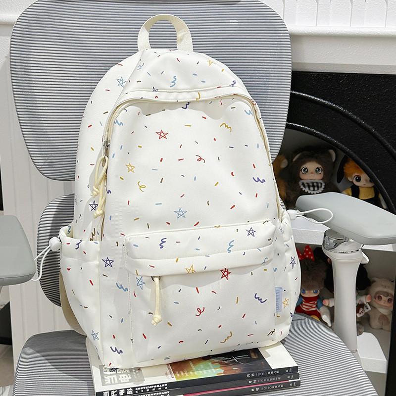 Lässiger Studentenrucksack aus Nylonmaterial mit Blumendruck für Reisen und den Schulgebrauch