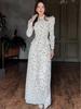 2025 Summer Long-Sleeve Printed Jacket and High-Waisted Slim Midi Skirt Set