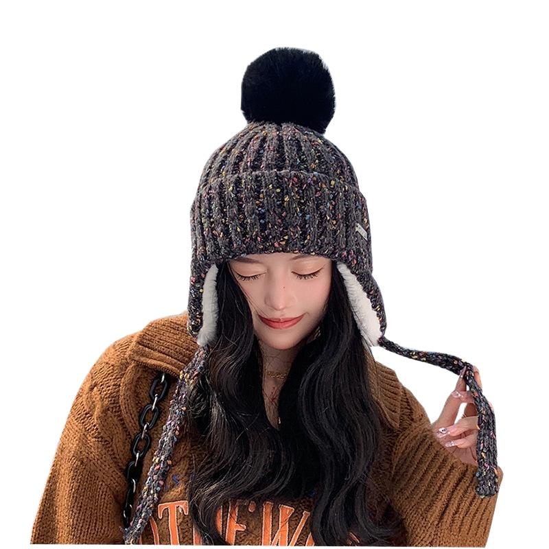 Neue Winter-Haarball-Farbe Wollmütze Kälteschutz Ohrenschutz Strickmütze Koreanische Version Plüsch Warme Mütze Damen Tide