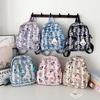 Schultasche Kinder neuer Grundschulrucksack Cartoon niedlicher Aufdruck leichtgewichtiger Rucksack Trend
