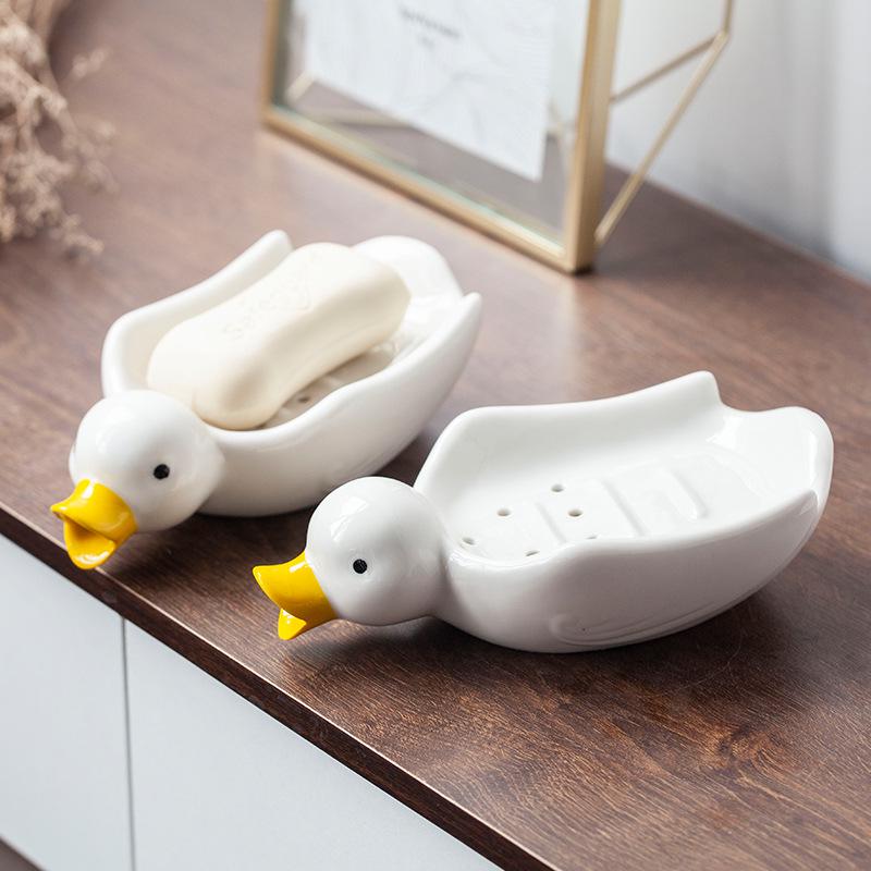 Charming Duck Ceramic Soap Dish: Creative and Cute, Drains Water for a Neat Bathroom.