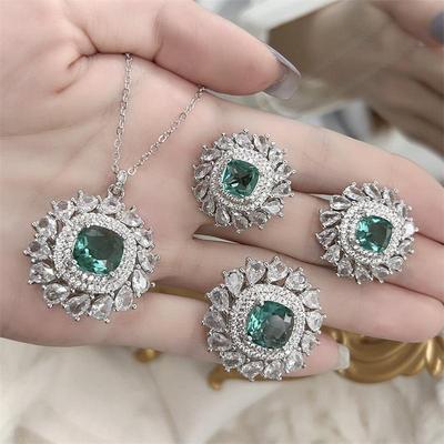 Emerald Diamond Retro High-End Light Luxury Three-Piece Set: Ring, Necklace & Earrings with Niche Design.
