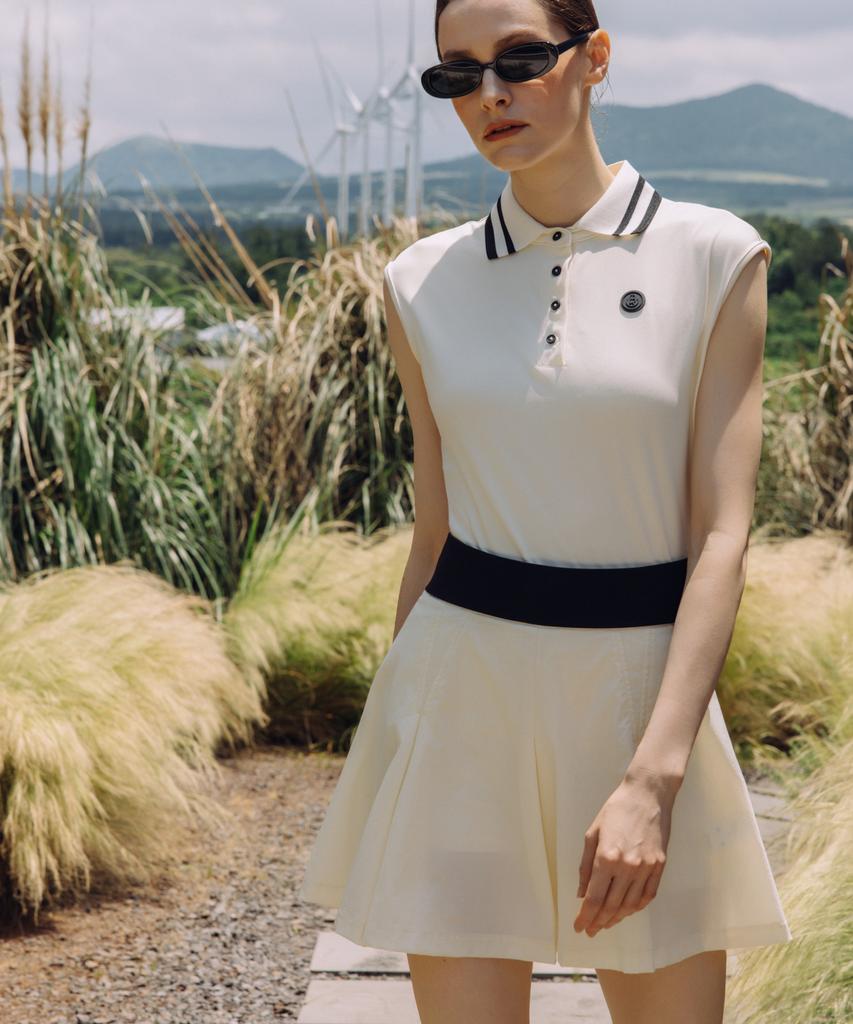 Over Golf Air Move Pleated Skirt (Cream)