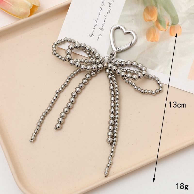 Creatieve Parel Strik Hanger Sleutelhanger: Prachtig Cadeau Accessoire voor Tas of Telefoonhoesje