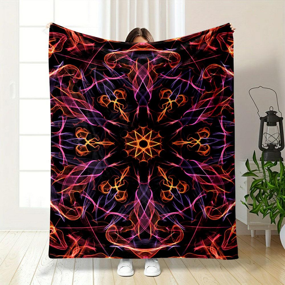 Symmetrical, vibrant flame-like patterns in orange, pink, and purple hues. for all seasons blanket lunch break throw gift