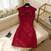 Vêtements pour femmes style européen et américain robe sans manches à nœud rouge à la taille polyvalente et simple pour le travail