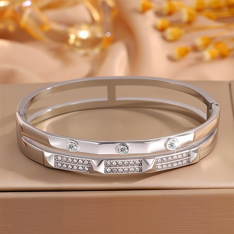 Titanium steel , personalized design European and American diamond , light luxury high-end wide version hollowed out full diamond