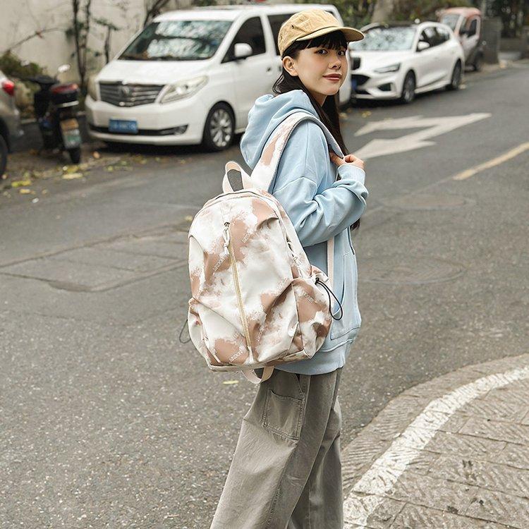 Schoolbag new Korean version of campus explosion simple and versatile lightweight student backpack college student junior high school shoulder travel 