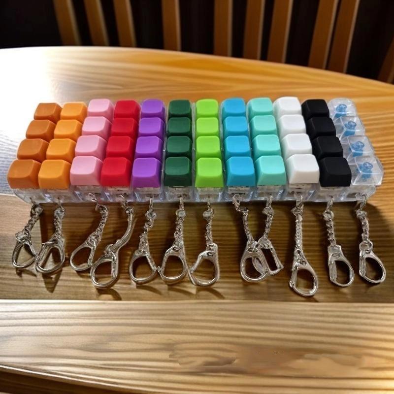 1 Stück 4 Tasten Finger Tastenkappen DIY Tastatur Klicker Spielzeug Knopf Tastenkappe Schlüsselanhänger für Erwachsene Stressabbau Spielzeug