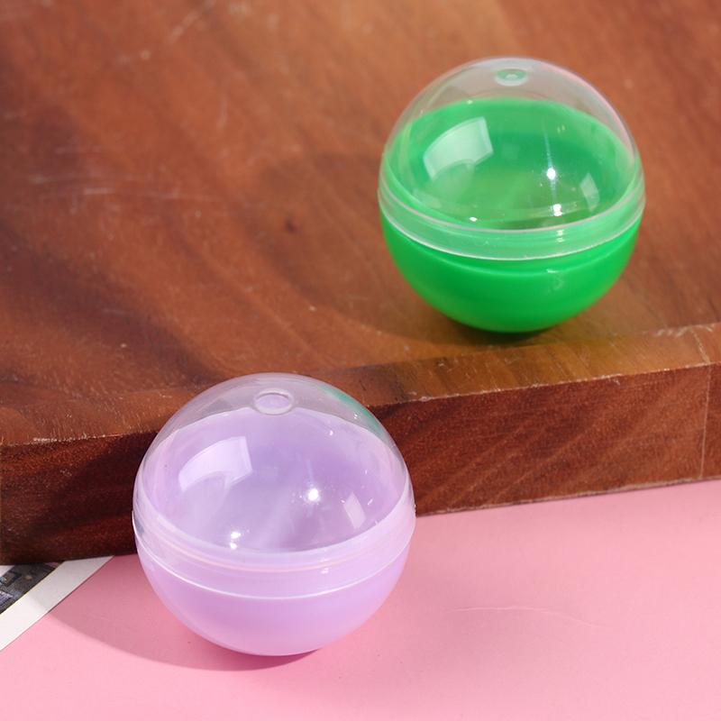 100 Stück leere Spielzeug-Automatenkapseln aus Kunststoff, halb transparent, halbfarbig, runde Kugel
