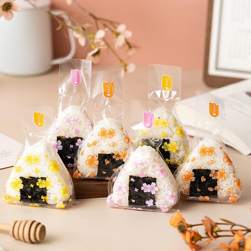100 Stuks Mooie Cartoon Driehoek Rijstbal Verpakkingszak Zeewier Onigiri Sushi Maakvorm Gereedschap Bento Accessoires