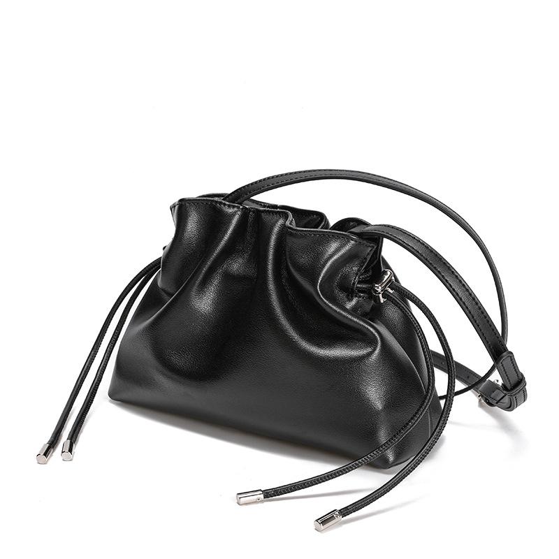 Dámská kabelka z pravé kůže se stahovací šňůrkou, skládaná crossbody taška vše v jednom