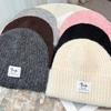 New Autumn and Winter Patch Knitted Wool Hat Children's Fashion Versatile Travel Bag Head Hat Cold Hat Men and Women