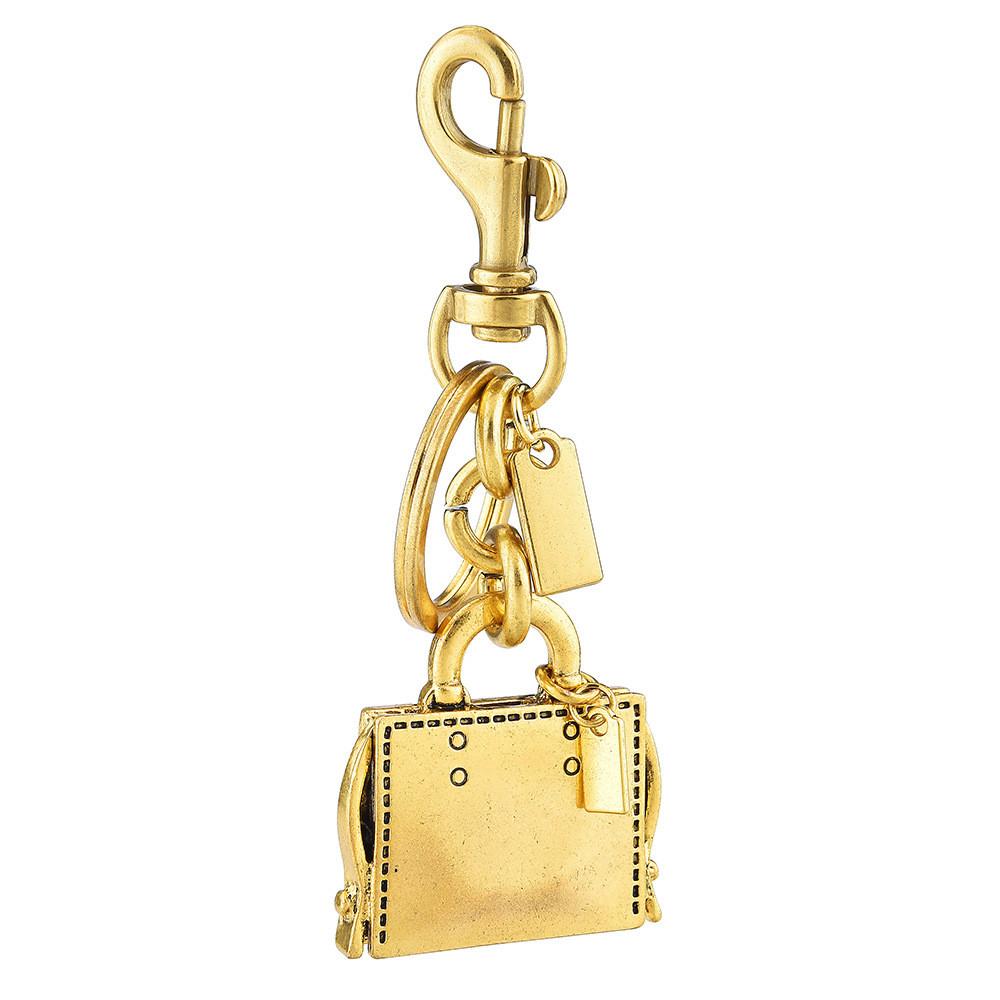 Metallic Keychain Bag Charm With Engraved Book Pattern For Fashion Accessories