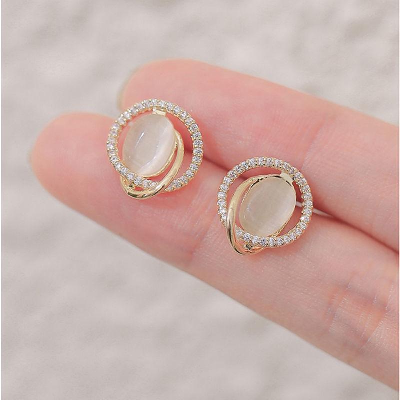 Boucles d'oreilles à tige ovales en opale pour femmes, bijoux tendance, strass, cristal, torsadé, métal, creux, géométrie irrégulière