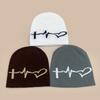 Autumn and winter design electrocardiogram jacquard knitted hat for men and women to keep warm, simple niche casual cold hat pullover hat