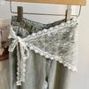 Ceinture en dentelle brodée, foulard en soie avec jupe en tulle et accessoire décoratif pour draper les hanches.
