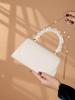 Elegant light luxury solid color women's handbag, fashionable and romantic banquet clutch, suitable for women's daily use.
