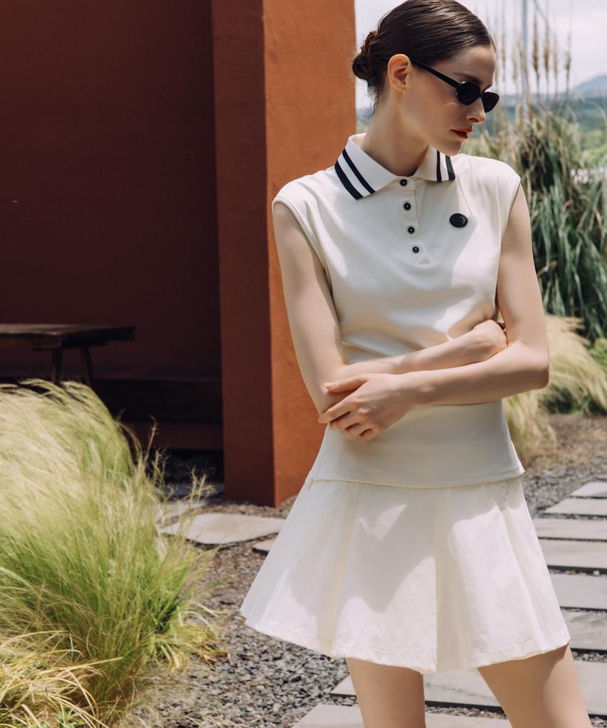 Over Golf Air Move Pleated Skirt (Cream)