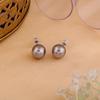 Women's Rhodium Plated Stud Earrings with Dazzling Pearls