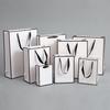 White Gift Bags for Women's Clothing, Jewelry, and Beauty Packaging