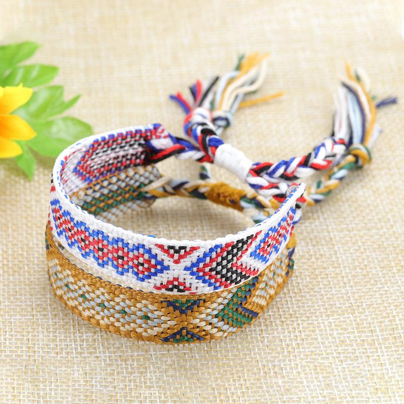 Handgemaakte gevlochten armband kleurrijke kwast gelukkige vriendschap handtouw fabrieksvoorraad