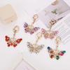 Dreamy Gem Butterfly Pendant Keychain – Colorful Crystal Insect Design, Exquisite Bag Accessory and Gift.