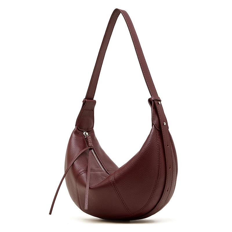 2026 Neue Croissant-Knödel-Tasche aus Vollnarbenleder Einzigartige einfarbige Schulter-Crossbody-Tasche Damen Praktische Pendler-Handtasche
