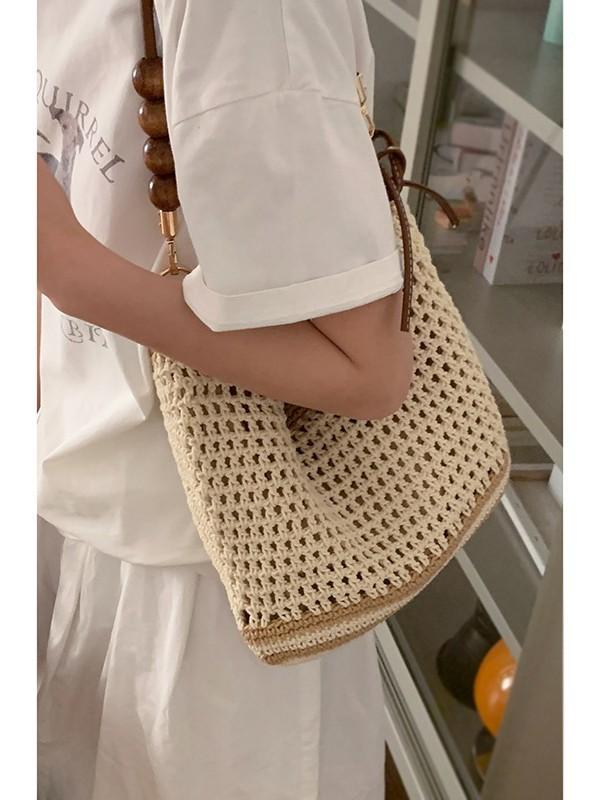 Sac tressé creux pour femme été nouveau sac en paille grande capacité épaule bandoulière vacances bord de mer sac de plage