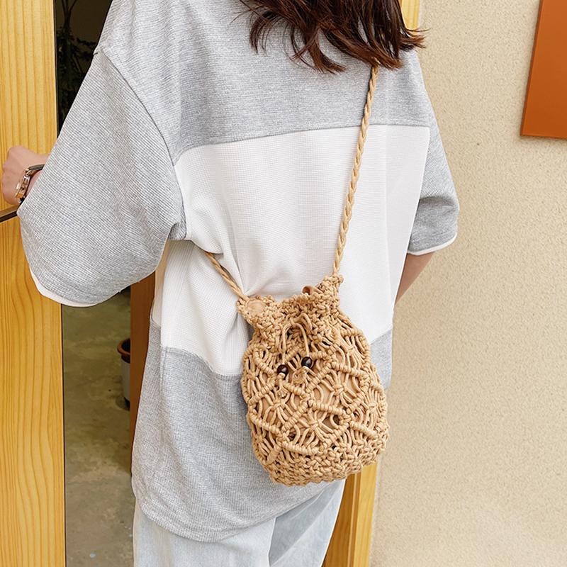 Sommer Neue Wasser Eimer Tasche Koreanische Version Strand Gras Gewebte Tasche Hohl Gewebt Schulter Tasche Umhängetasche Kleine Tasche Mädchen