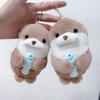 Niedlicher Otter Wish Holding Fish Puppe Schlüsselanhänger Kreative Plüsch Puppe Spielzeug Tasche Hängender Anhänger Geschenk