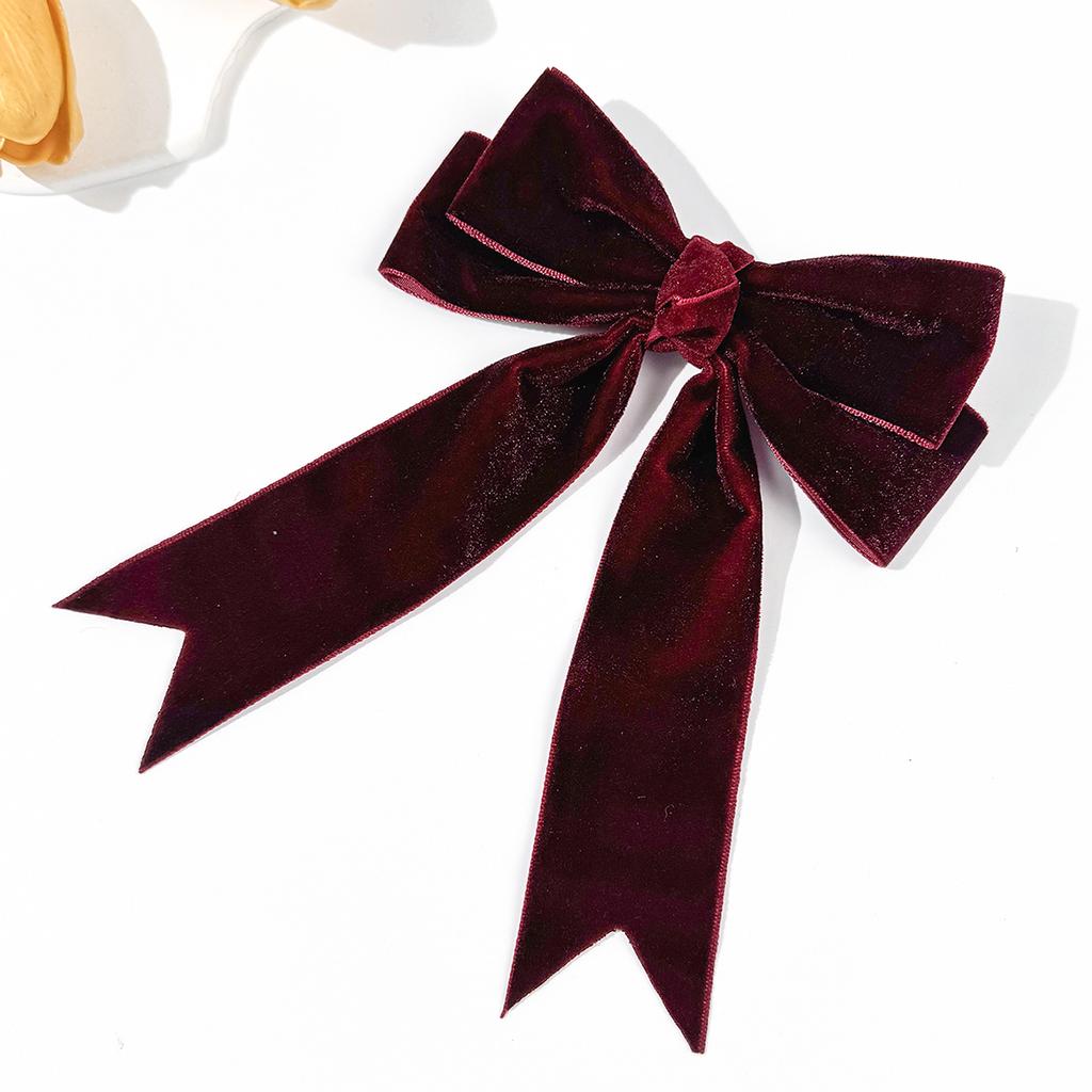 Eine neue Haarspange mit Samtschleife aus Japan und Südkorea, ein einfaches und elegantes Haaraccessoire für Frauen in einfarbig