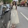 Women's Halter Neck Tassel Dress: Hollow Waist, Tie Belt, Slim Fit Long Skirt, Holiday Style.