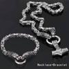 Two-piece vintage Viking wolf head amulet necklace and bracelet set for men and women, Nordic hammer pendant necklace and bracelet.