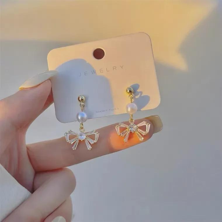 Korean Pearl Bow Clip-On Earrings - Elegant & Versatile Design