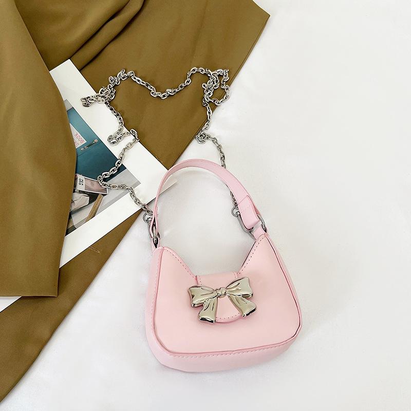 Borsa a mano da donna con fiocco tinta unita dolce 2025 nuova alla moda di nicchia borsa a spalla borsa a tracolla con catena