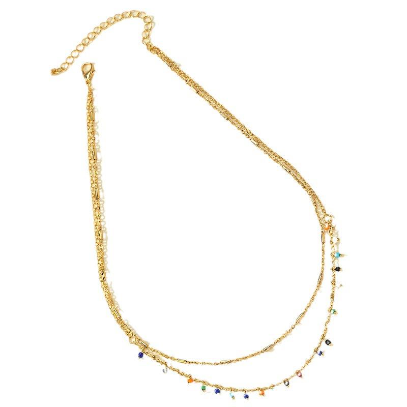 Collier de perles de couleur simple à la mode style cool japonais et coréen pour femmes avec un tempérament de niche rétro haut de gamme sensation chaîne clavicule