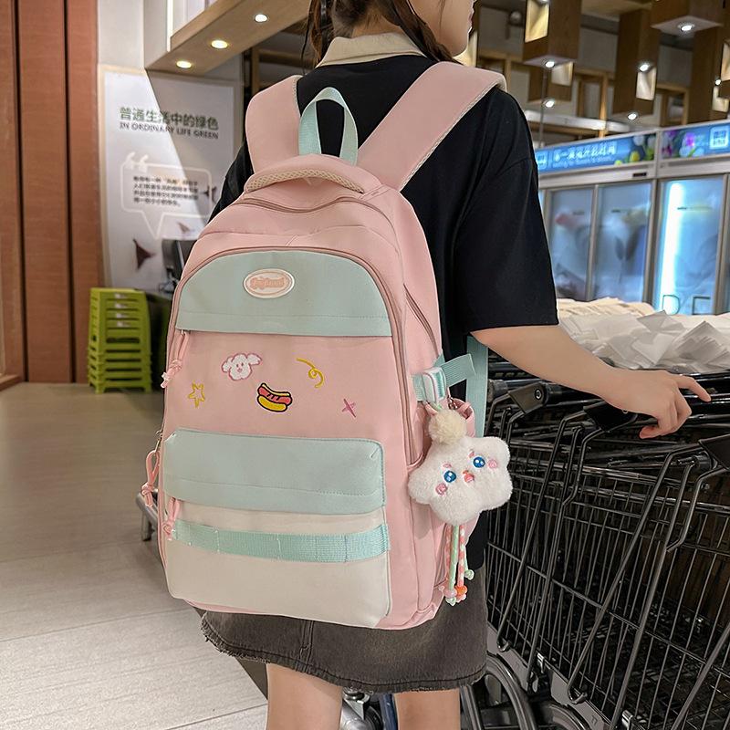New small fresh contrasting color schoolbag women's light casual outdoor backpack junior high school students high value backpack