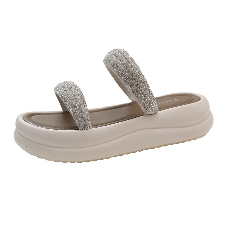 Nouveau strass sensation vent 2025 merde muffin fée sandales pantoufles femme été porter double ceinture foulant fond épais une ligne traîne