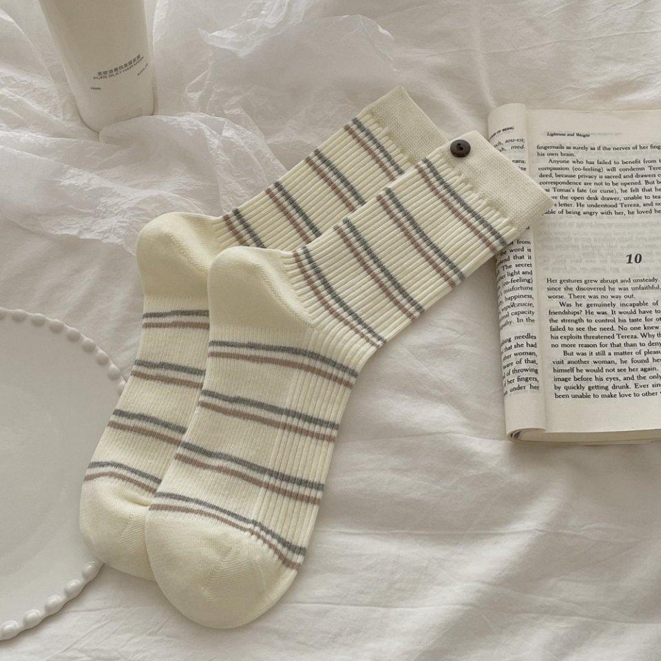 Chaussettes rayées rétro pour femmes en automne et en hiver, légèrement pressées pour affiner, longues chaussettes montantes jusqu'aux cuisses, chaussettes bouclettes, chaussettes en coton