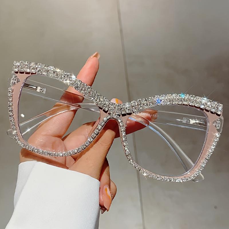 A Pair of Women'S Stylish Cat-Eye Glasses Adorned with Rhinestones