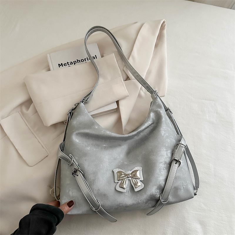 Sac cabas de grande capacité pour les trajets quotidiens, nouvelle version coréenne d'été, simple et de grande valeur, avec papillon, simple épaule, double dos, sac à double usage