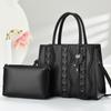 Light Luxury High-end Sense Niche High-end Sense Rivet Underarm Bag New Tote Shoulder Bag Portable Versatile Commuter Women's Bag