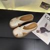 Baotou hollow slope heel half drag sandals women wear summer new French temperament flat bottom one word cool single shoes