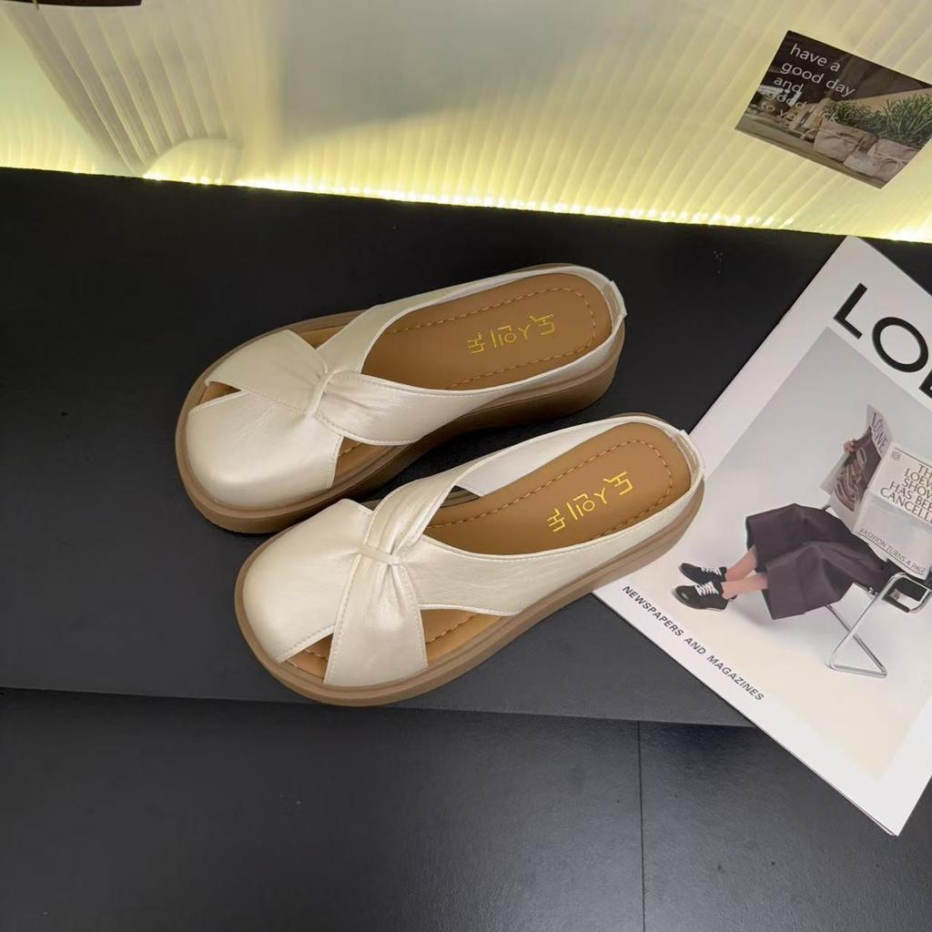 Baotou hollow slope heel half drag sandals women wear summer new French temperament flat bottom one word cool single shoes