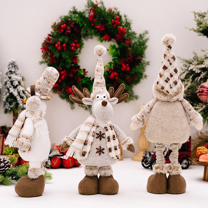Skurrile dehnbare Puppenfigur im amerikanischen Stil für Weihnachten mit älterem Schneemann und Rentier